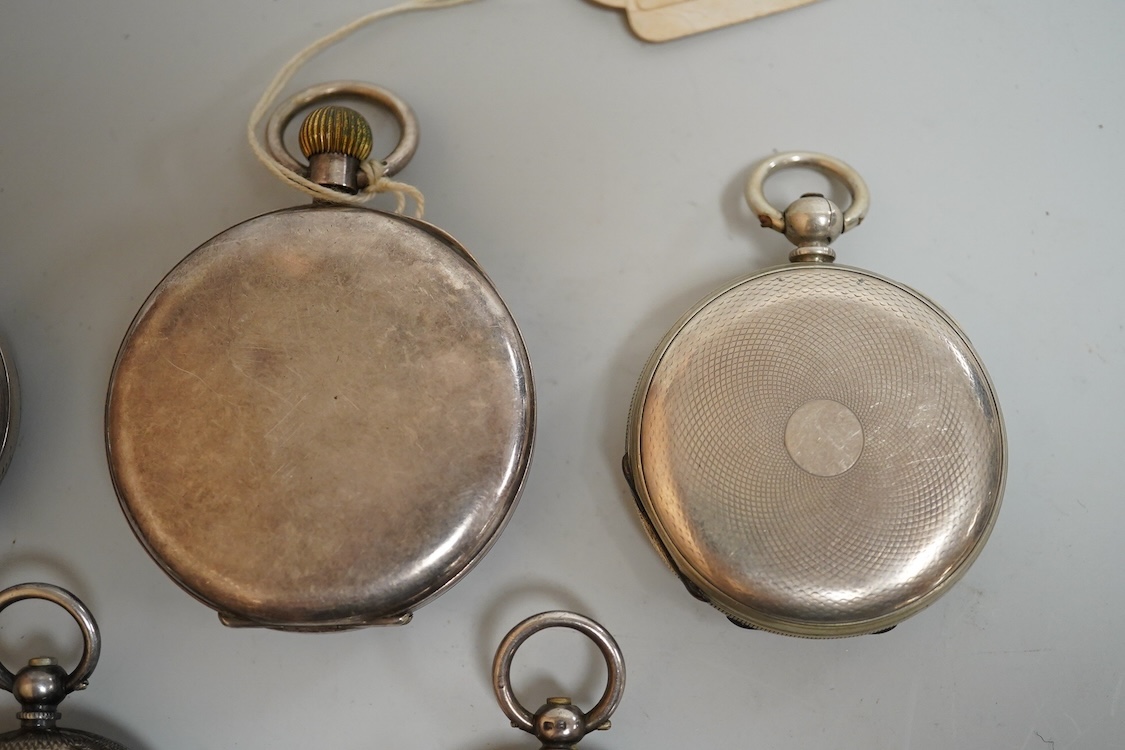 An early 20th century silver open faced pocket watch, with Arabic dial and subsidiary seconds, together with four other white metal open faced fob watches and a white metal half hunter pocket watch, case diameter 44mm.